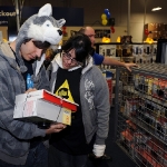 In this photo provided by Nintendo of America, Frances D. of Perris , Calif. (left) and Taylor L. of Corona, Calif. make an early-morning trip to the Best Buy Burbank, Calif., store on Nov. 25, 2011, to get a head start on Black Friday deals like a Special Edition The Legend of Zelda 25th anniversary Cosmo Black Nintendo 3DS system, bundled with The Legend of Zelda: Ocarina of Time 3D game. (AP Photo/Nintendo, Bob Riha, Jr.) No Sales
