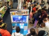 In this photo released by Nintendo of America, hundreds of Nintendo fans line up at the Best Buy in Culver City, CA to get a special first-look at "Super Smash Bros." for Wii U and Nintendo 3DS on Wednesday, June 11, 2014 in Culver City. More than 100 Best Buy stores in the U.S. and Canada hosted a "Super Smash Bros. Smash-Fest @ Best Buy" to bring the E3 experience to consumers to play the game before it's release date later this year. (Photo by Nintendo/Bob Riha, Jr.)