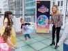 In this photo provided by Nintendo of America, Oliva Holt has a first dance with young fans at the Enchanted Ball Event at Nintendo NY to celebrate the upcoming launch of the Disney Magical World 2 game for the Nintendo 3DS family of systems on Oct. 14.